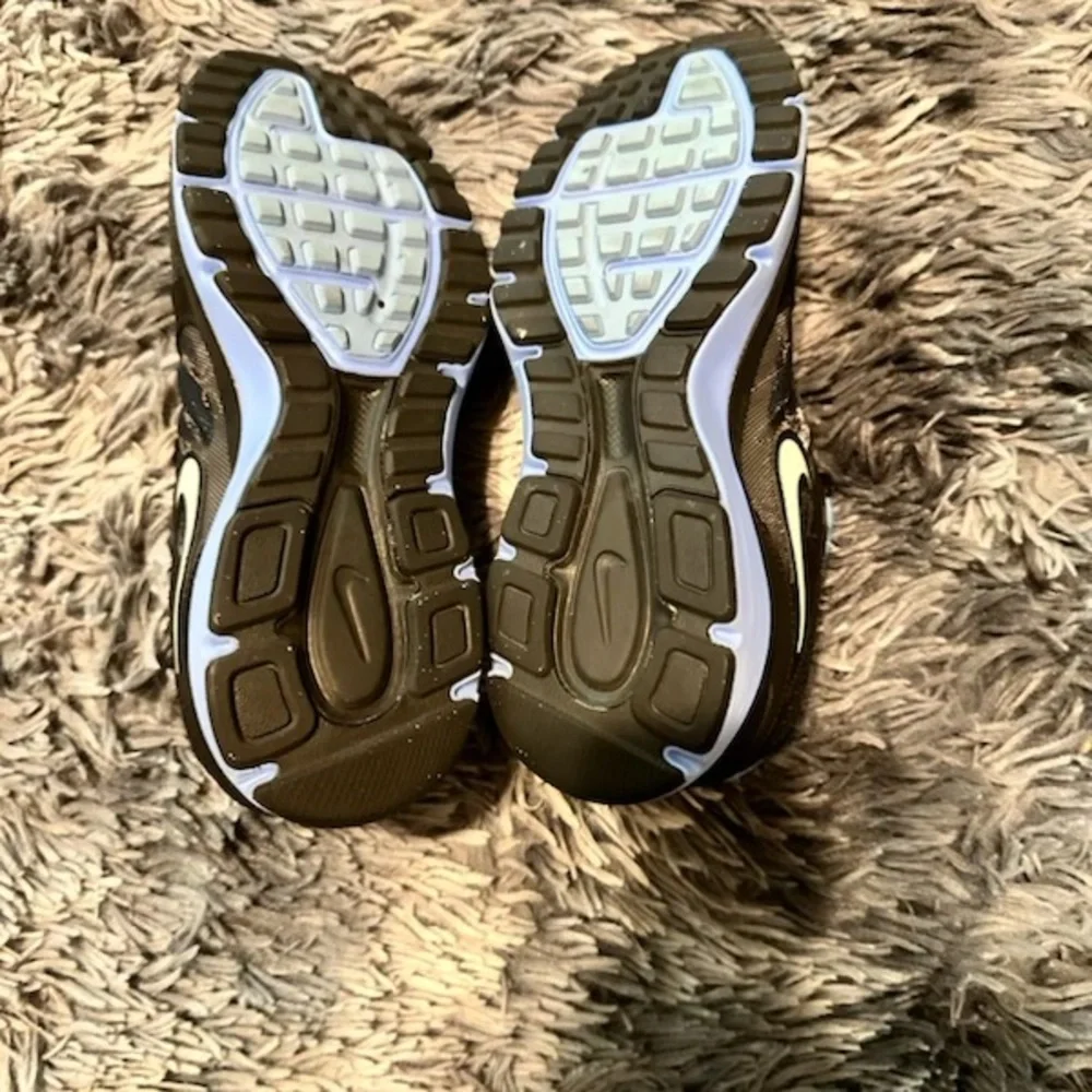 Nike Black and Light Blue Athletic Shoes